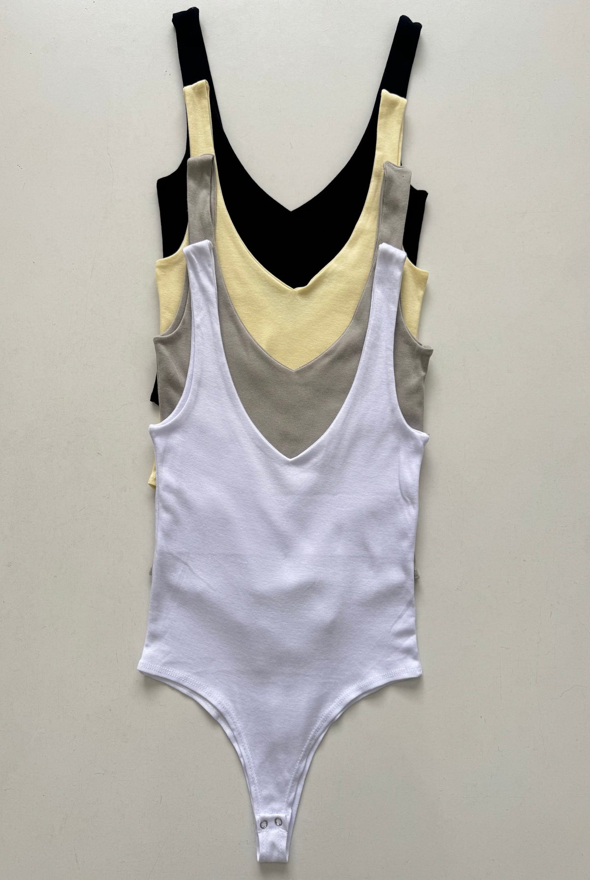 BODY ALGODÓN REEB CUELLO V