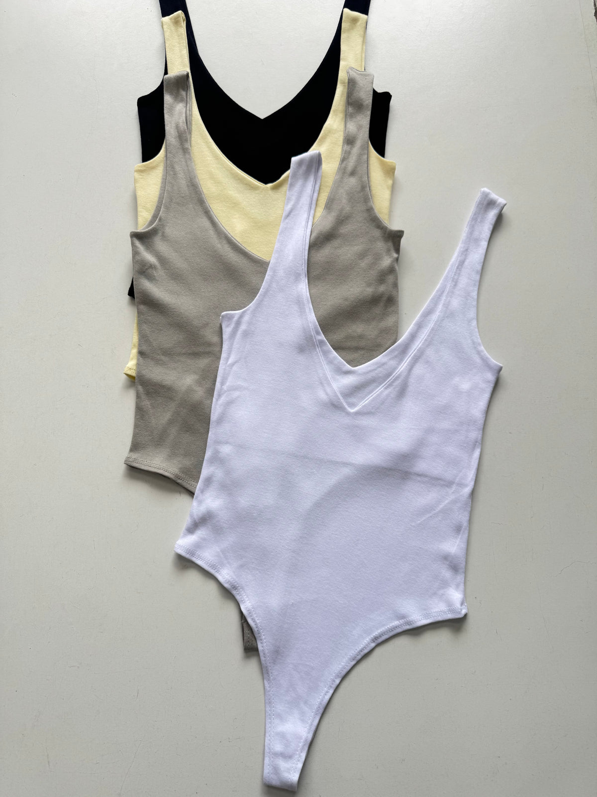 BODY ALGODÓN REEB CUELLO V