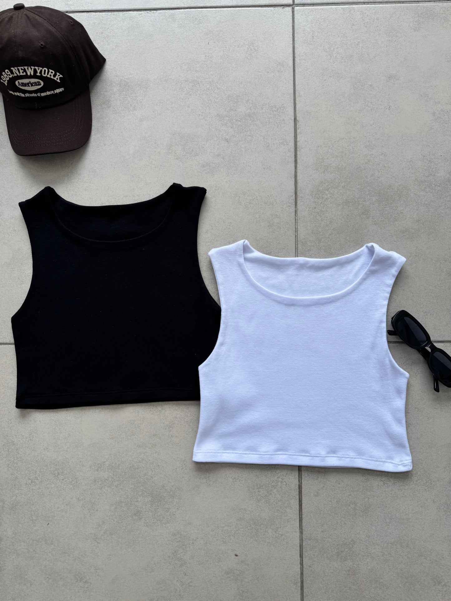 MUSCULOSA EMBOLSADA CORTA